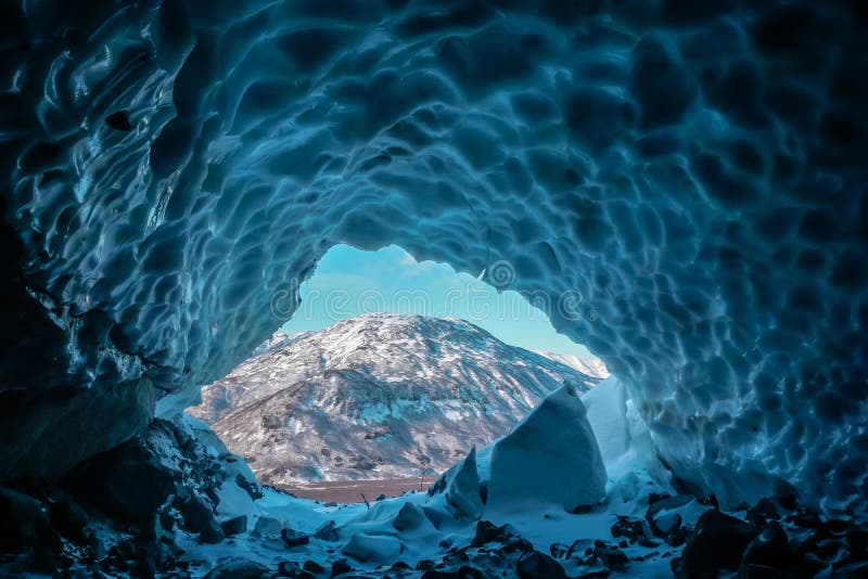 Inside a cold ice cave royalty free stock photography