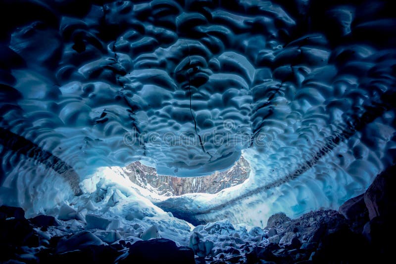 Inside a cold ice cave royalty free stock photography