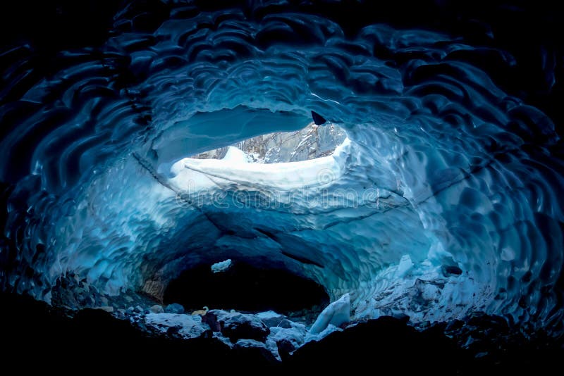 Inside a cold ice cave stock photography