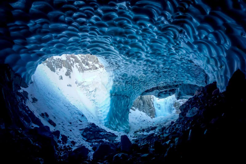 Inside a cold ice cave royalty free stock photography