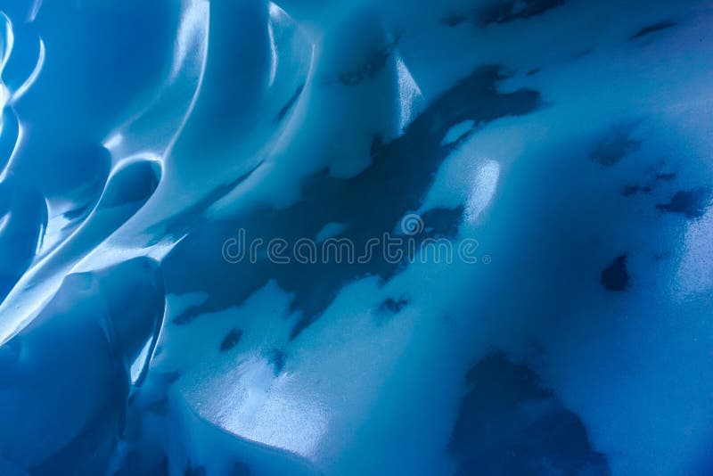 Inside a cold ice cave royalty free stock photo