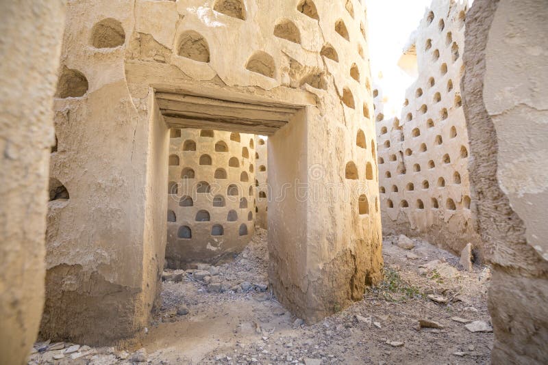 Inside crumbling walls of dovecote mud building in Ampudia