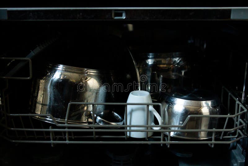 Inside the Dishwasher the Pans with Cups are Dirty Stock Photo Image