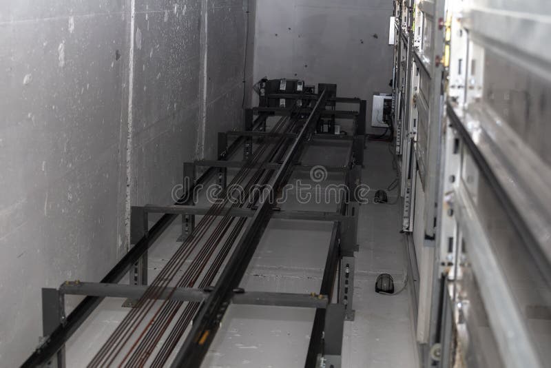 Inside Elevator Shaft and Traction Ropes 2 Stock Photo Image of city