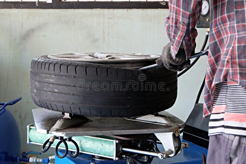 Inside a Garage Changing Wheels or Tires Stock Image Image of