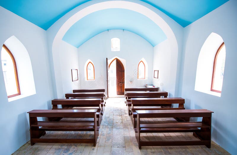 Inside interiors of small generic church.