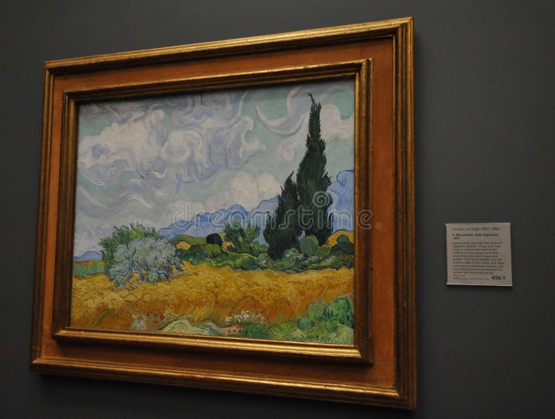 Inside National Gallery Museum in London, looking at Van Gogh painting