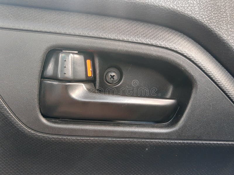 Inside Old Grey Door Car Opener and Unlock Handle Car Door Stock Photo