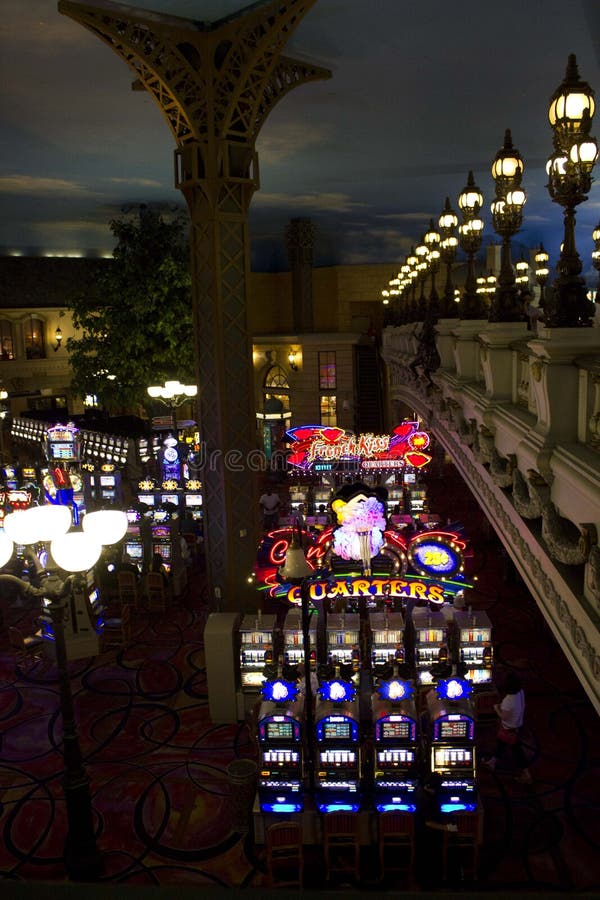 Picture/Photo: Man and woman standing on plaza inside Paris casino