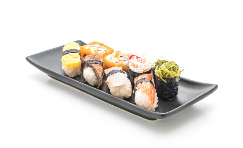 Insieme dei sushi e del rotolo di maki fotografia stock Insieme dei sushi e del rotolo di maki fotografia stock