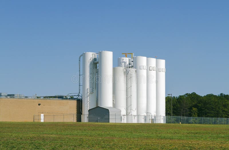 Insieme del silos industriale di stoccaggio fotografie stock Insieme del silos industriale di stoccaggio fotografie stock