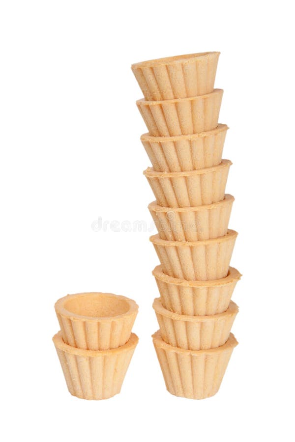Insieme vuoto dei tortini come la torre pendente isolata su backgr bianco fotografia stock libera da diritti Insieme vuoto dei tortini come la torre pendente isolata su backgr bianco fotografia stock libera da diritti