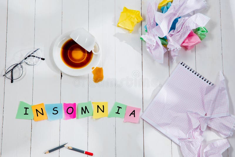 INSOMNIA. Message in wooden cubes on a table background. stock photo INSOMNIA. Message in wooden cubes on a table background. stock photo