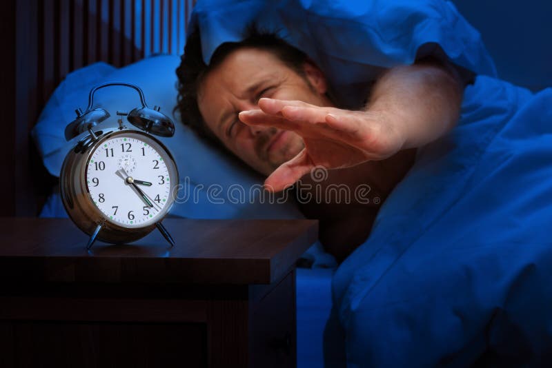 Insomnie ou alarme tôt images libres de droits Insomnie ou alarme tôt images libres de droits