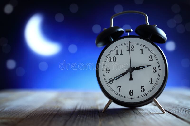 Insonnia della sveglia nel mezzo della notte fotografia stock Insonnia della sveglia nel mezzo della notte fotografia stock