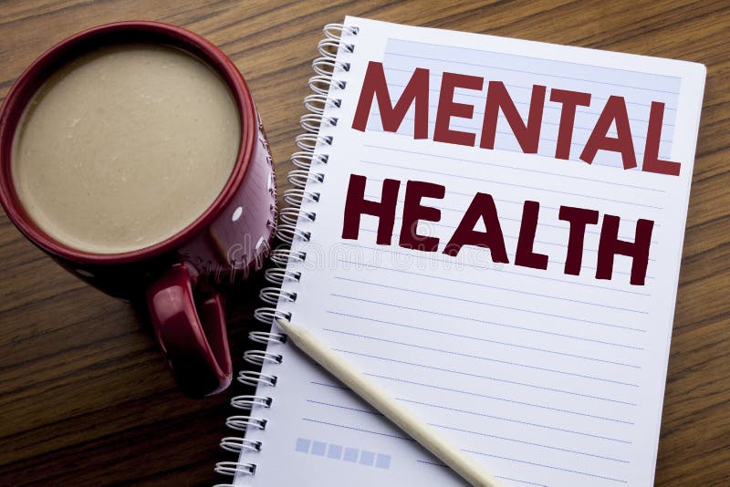 Hand writing text caption inspiration showing Mental Health. Business concept for Anxiety Illness Disorder written on note paper notepad on the wooden background with coffee and pen. Hand writing text caption inspiration showing Mental Health. Business concept for Anxiety Illness Disorder written on note paper notepad on the wooden background with coffee and pen.