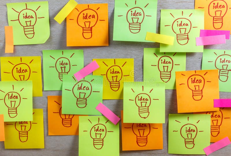 Inspiration Concept Light Bulb Idea on Colorful Sticky Note Pad Stock