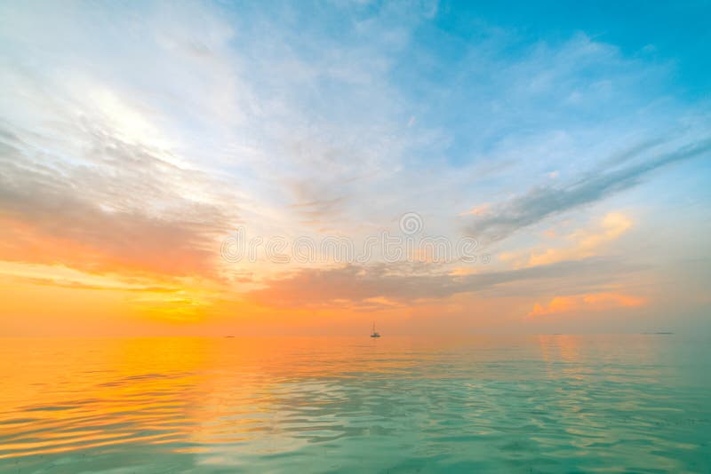 Inspirational calm sea with sunset sky. Meditation ocean and sky background. Colorful horizon over the water