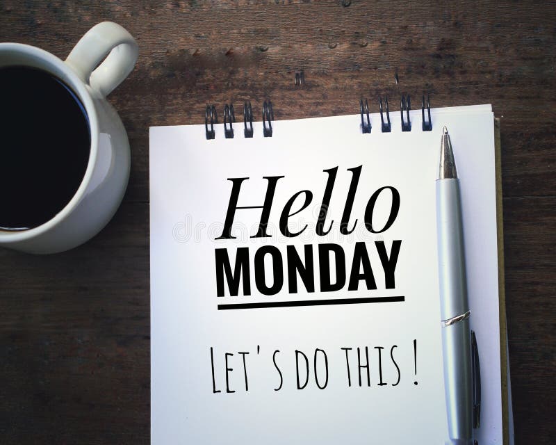 Inspirational quote - Hello Monday. Lets do this. Handwriting text written on a white notebook with pen and a white cup of morning stock photography