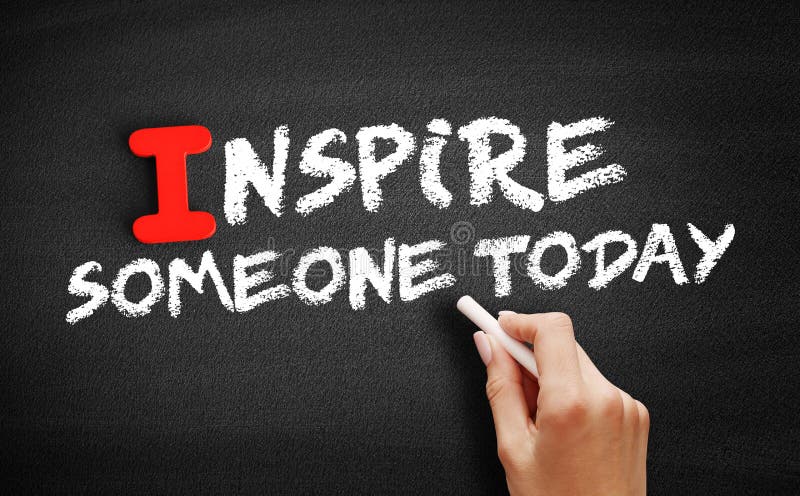 Inspire Someone Today text on blackboard stock photos