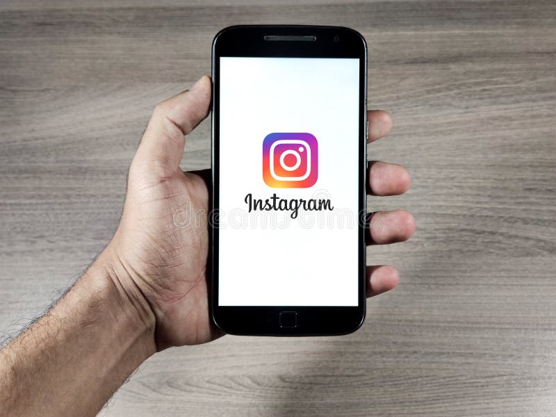 Instagram logo on the smartphone screen. Instagram is an online social network for sharing photos and videos.