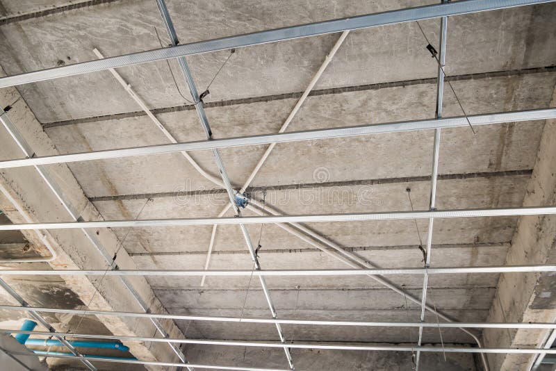 Install Metal Frame For Plaster Board Ceiling At House Stock Photo