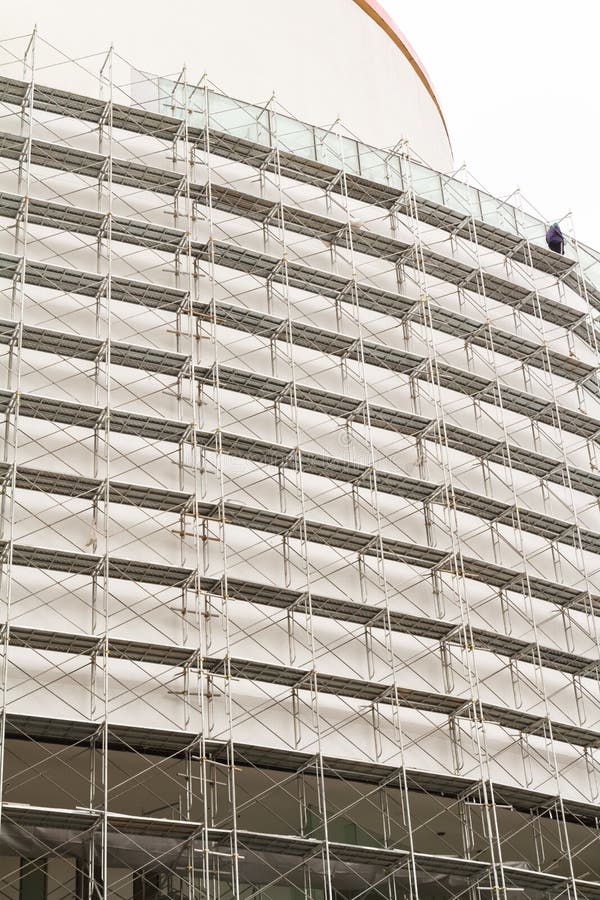 Install scaffolding around building. Detail install scaffolding around external building for renovate