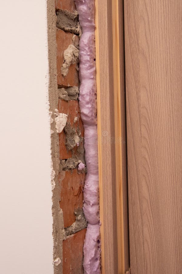 Installation of Doors Using Polyurethane Foam Mounting Stock Image