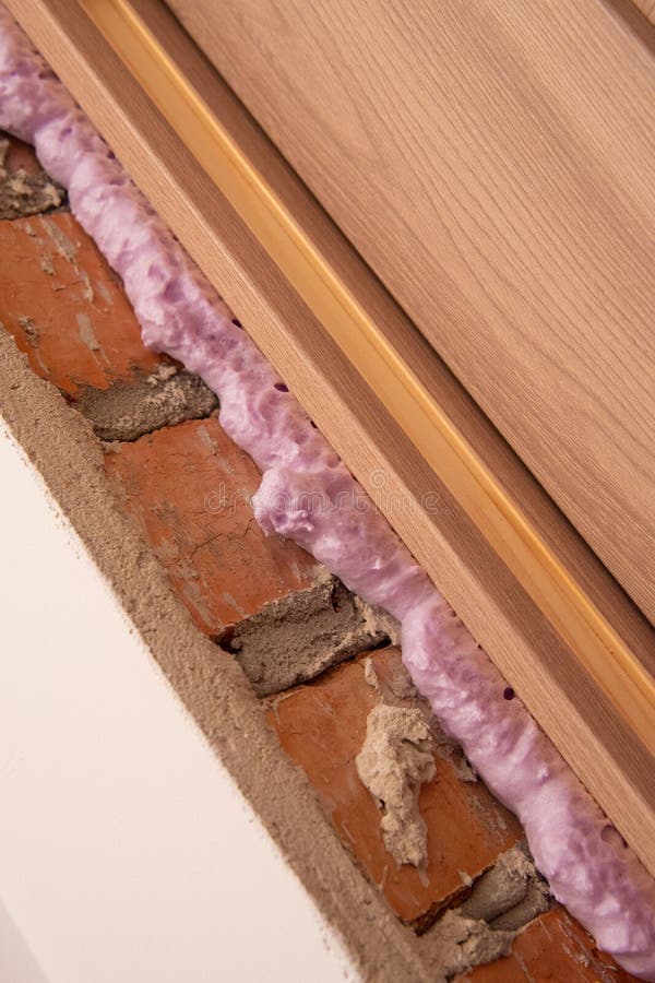 Installation of Doors Using Polyurethane Foam Mounting Stock Photo