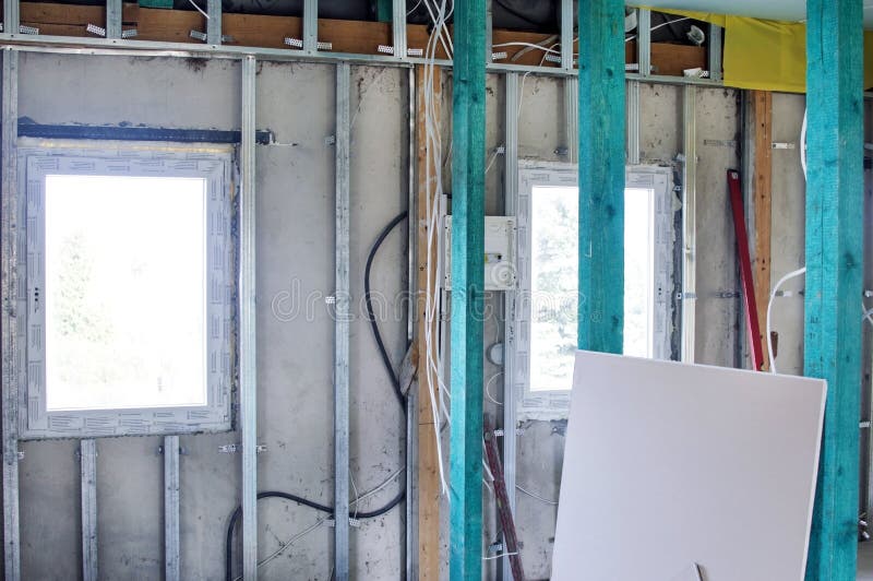 Installation of Drywall Constructions and Their Insulation Stock Image