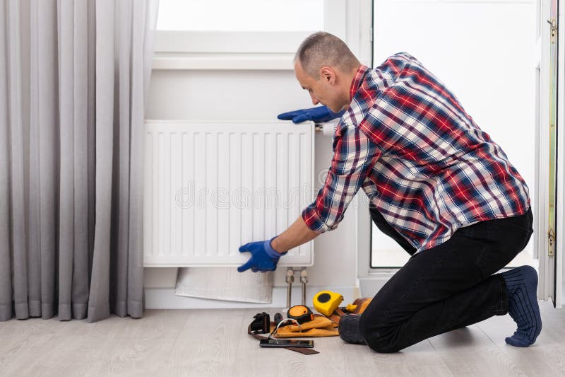 Installation et réparation du chauffage à la maison. services de pompe à chaleur image libre de droits