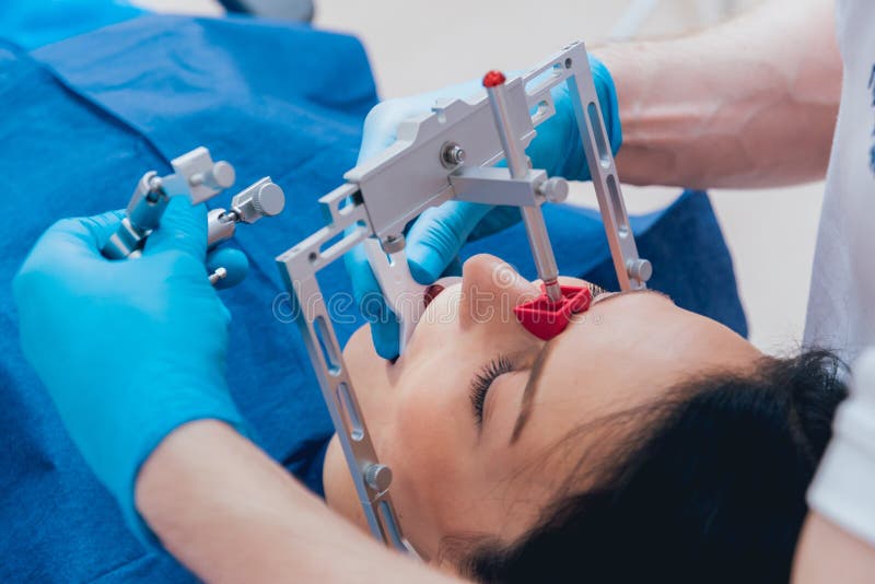 Installation of the Facebow. Functional Diagnostics. Dental Technology