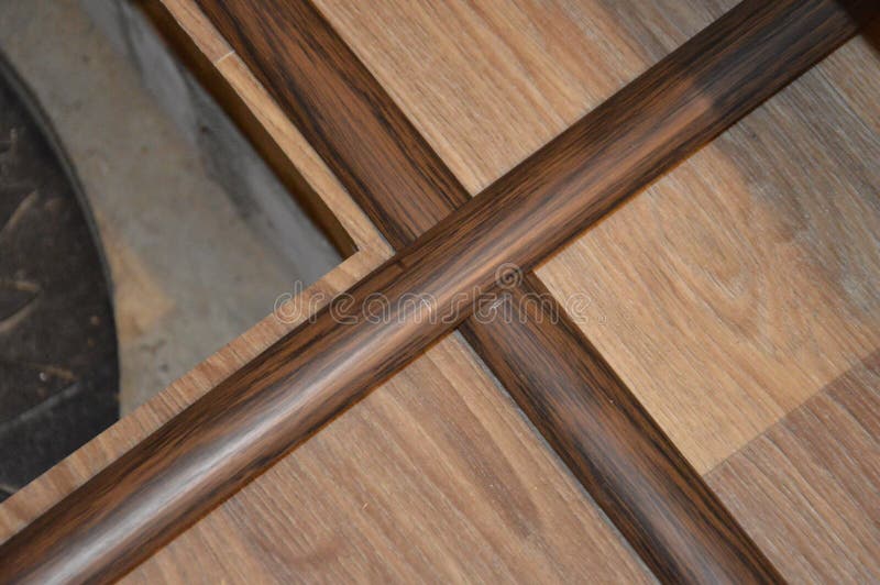 Installation of Floor Skirting Boards on the Floor and Linoleum Stock