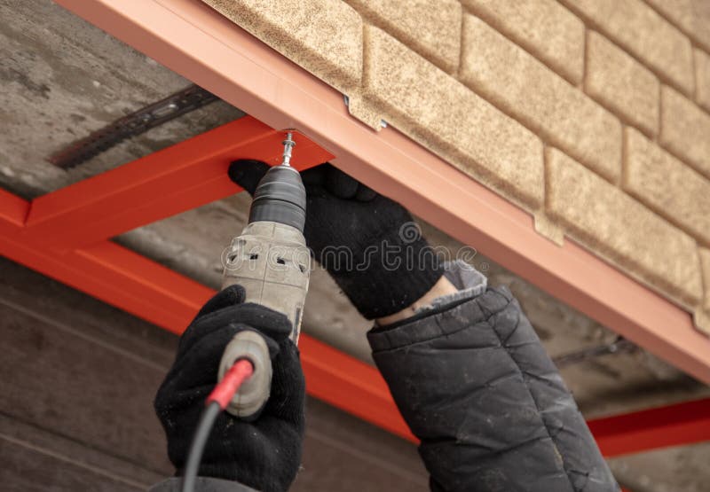 Installation of the gate in the garage metal stock photo