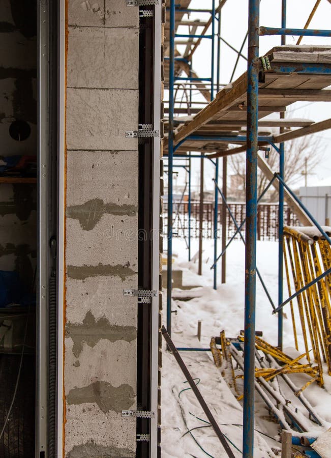 Installation of the gate in the garage metal royalty free stock photo