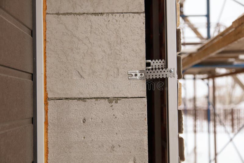 Installation of the gate in the garage metal stock images