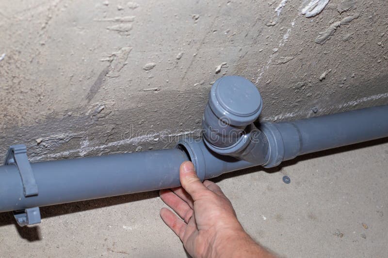 Installation of a Plastic Sewer Pipe in the Bathroom, Repair and