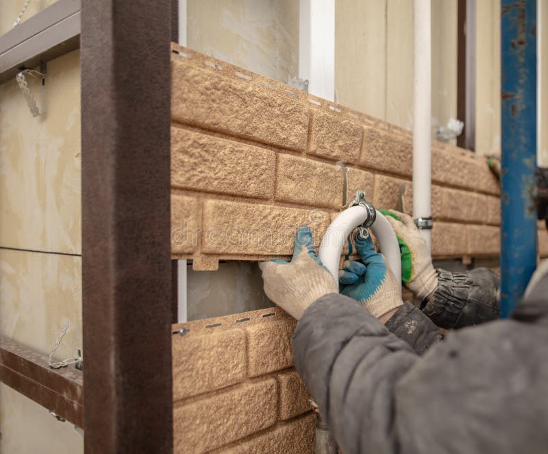 Installation of Plastic Siding Under the Brick Stock Image Image of