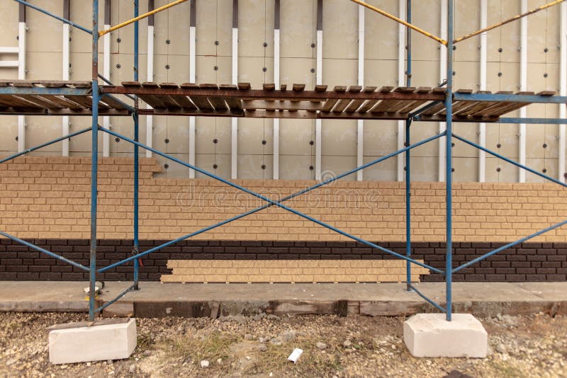 Installation of Plastic Siding Under the Brick Stock Image Image of