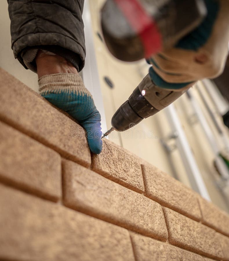 Installation of Plastic Siding Under the Brick Stock Photo Image of