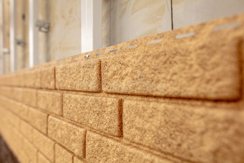 Installation of Plastic Siding Under the Brick Stock Image Image of