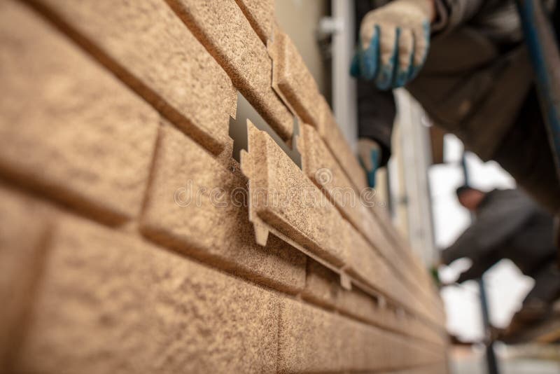 Installation of Plastic Siding Under the Brick Stock Image Image of
