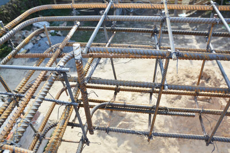 Installation of steel bar reinforcement, footing rebar, welded wire reinforcement in foundation concrete house construction
