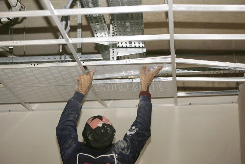 Installation of suspended stock image. Image of construction 182965897