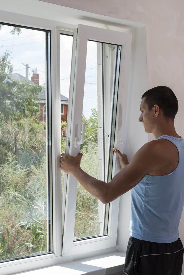 Installation und Reparatur von Plastikfenstern stockbilder Installation und Reparatur von Plastikfenstern stockbilder