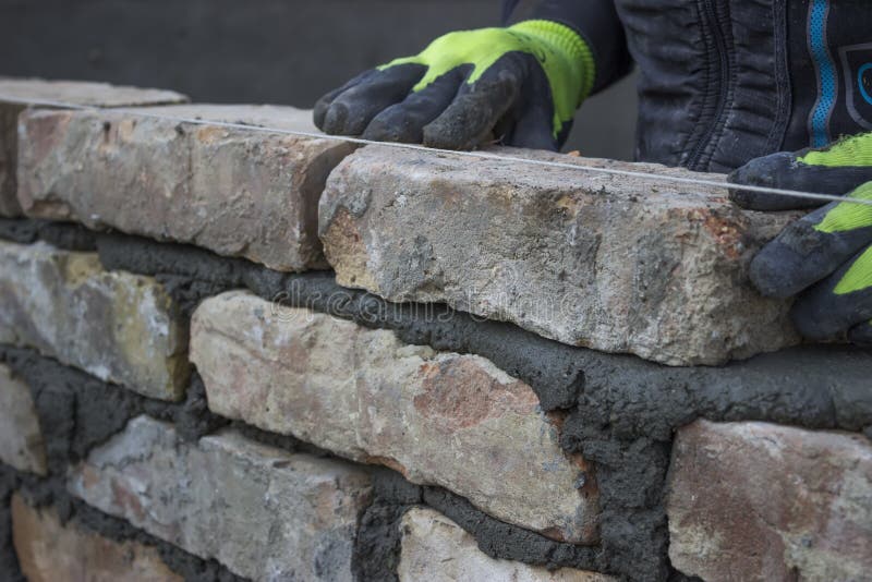 Installing Brick, Build a Brick Wall 3 Stock Image - Image of design