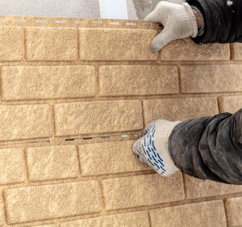 Installing Brick Siding on the Wall of the House Stock Photo Image of panels, people 142767120