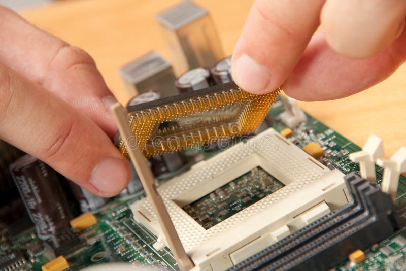 Installing computer processor stock image