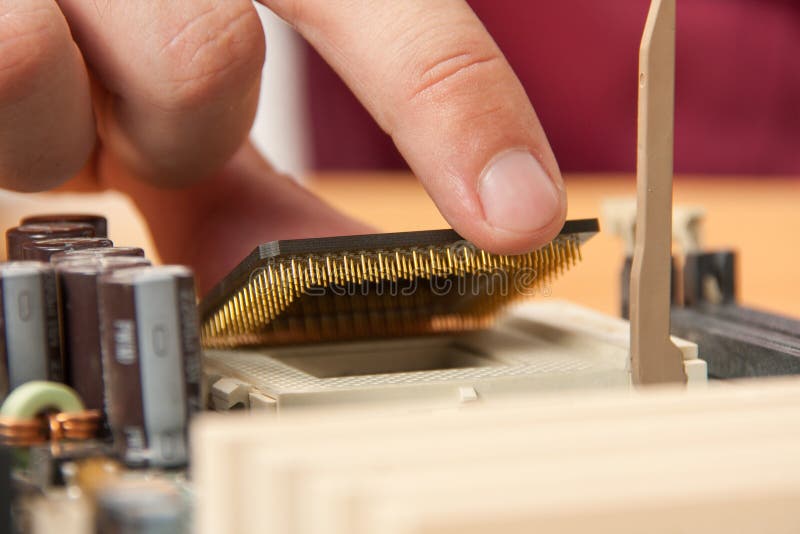 Installing computer processor stock photos