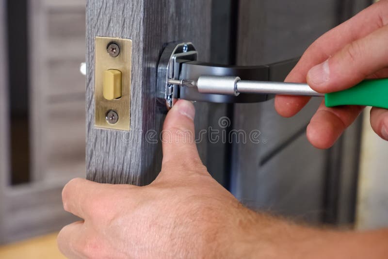 Installing Door Handle with Lock, Locksmith Fixes Bolt on Latch Plate